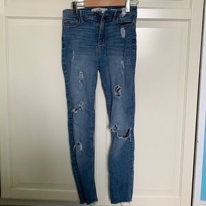 Hollister high rise blue ripped jeans.